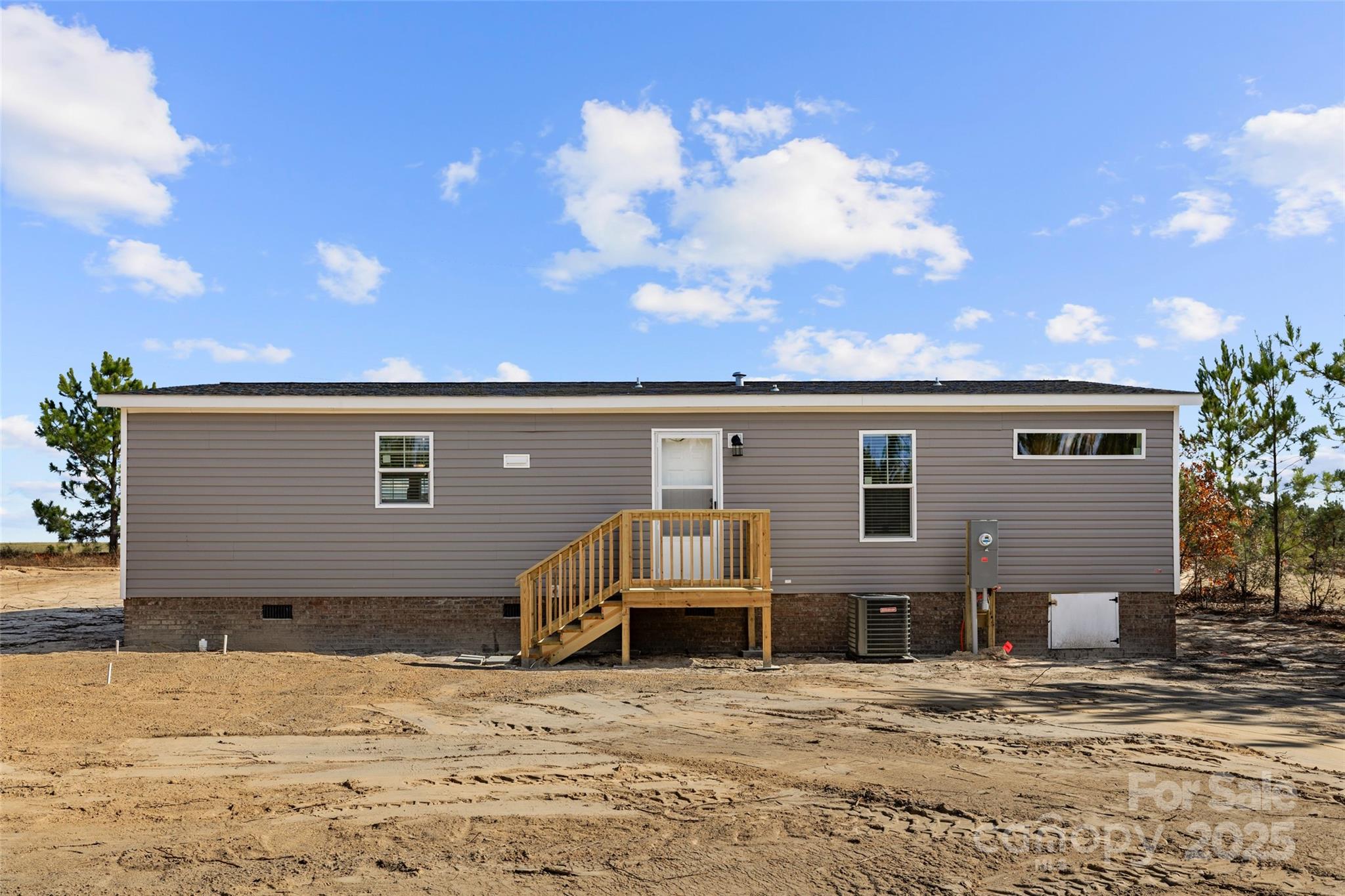 596 Jack Bone Hill Road Jefferson, SC 29718 - Photo 25 of 27 a view of a house with snow