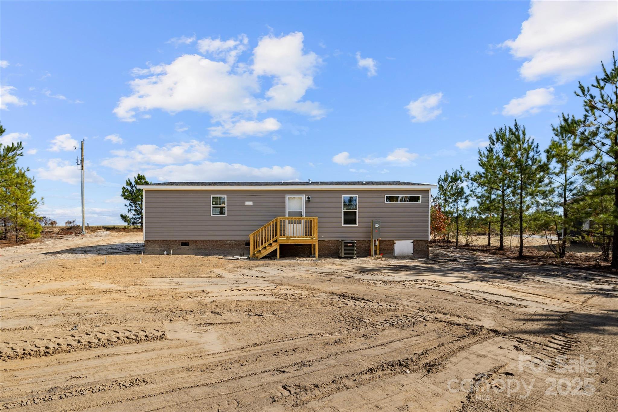 596 Jack Bone Hill Road Jefferson, SC 29718 - Photo 26 of 27 a view of a house with snow in the background