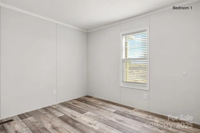 a view of a room with a window