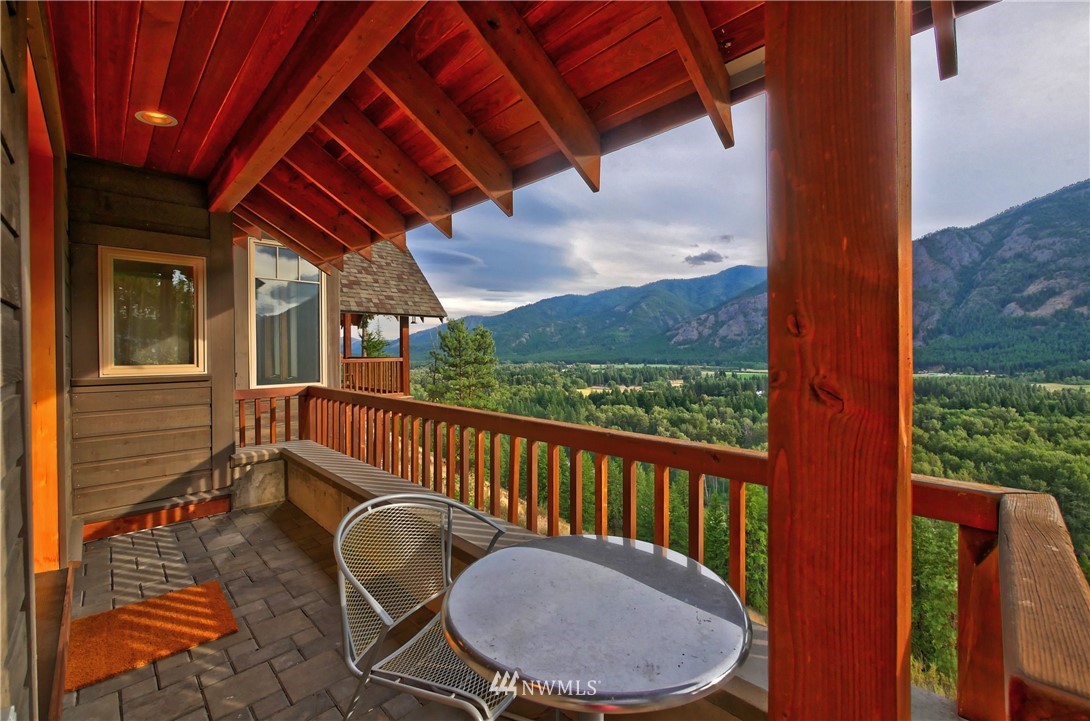 23 Bitterbrush Road Winthrop, WA 98862 - Photo 24 of 36 a view of a chair and table in the balcony