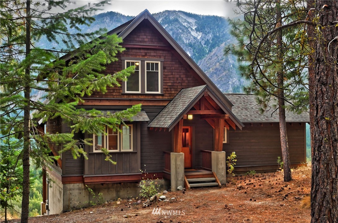 23 Bitterbrush Road Winthrop, WA 98862 - Photo 36 of 36 a front view of a house with garden