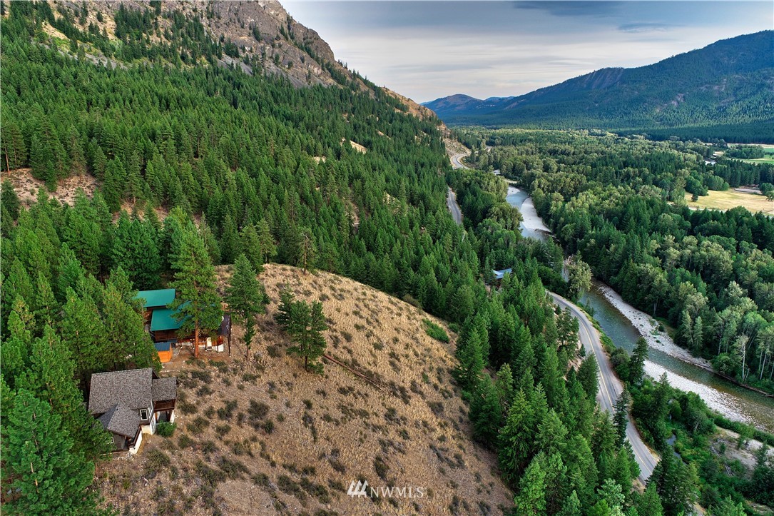 23 Bitterbrush Road Winthrop, WA 98862 - Photo 6 of 36 a view of a lush green forest with lots of trees