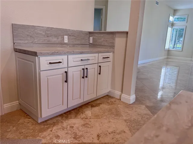 a view of a livingroom with an empty space