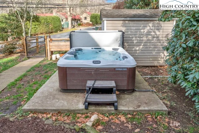 a view of a yard with an outdoor seating