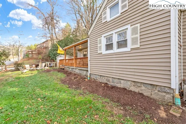 a backyard of a house with lots of green space