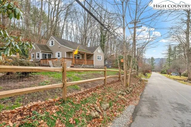 a house with trees in front of it