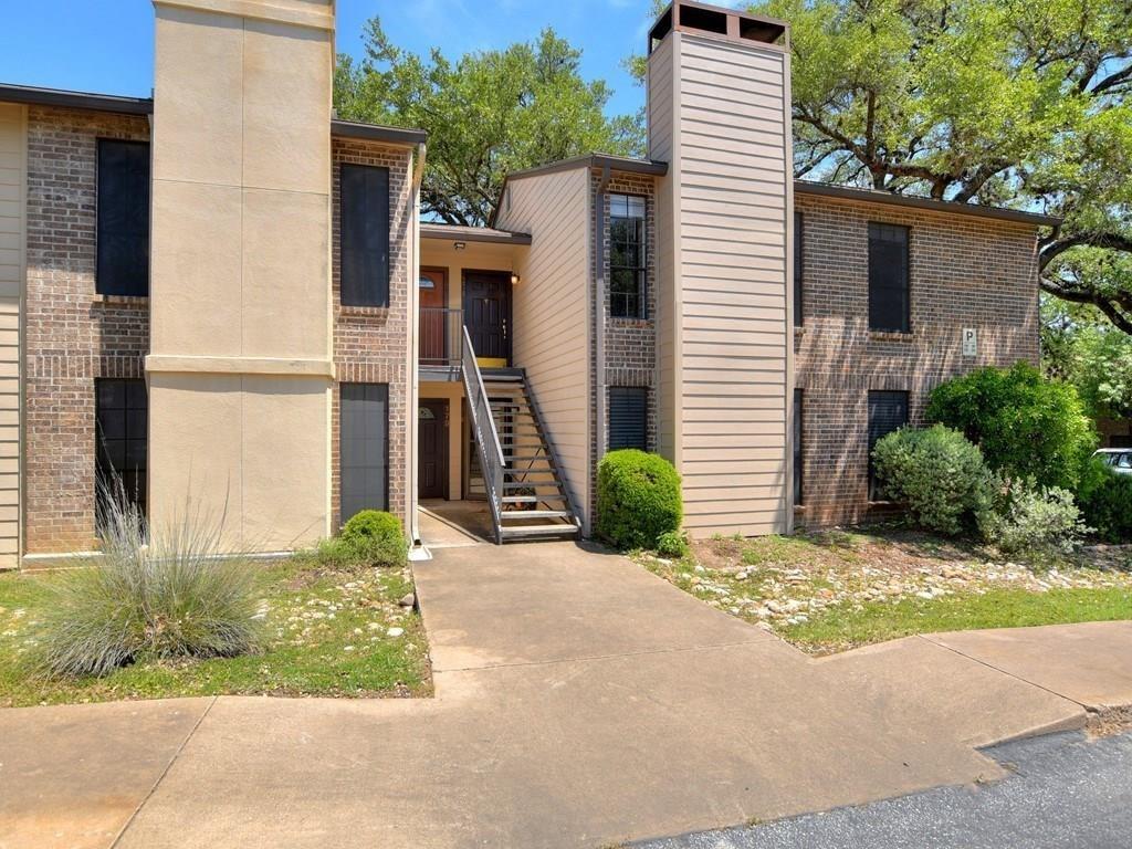 View of apartment building / complex with stairway