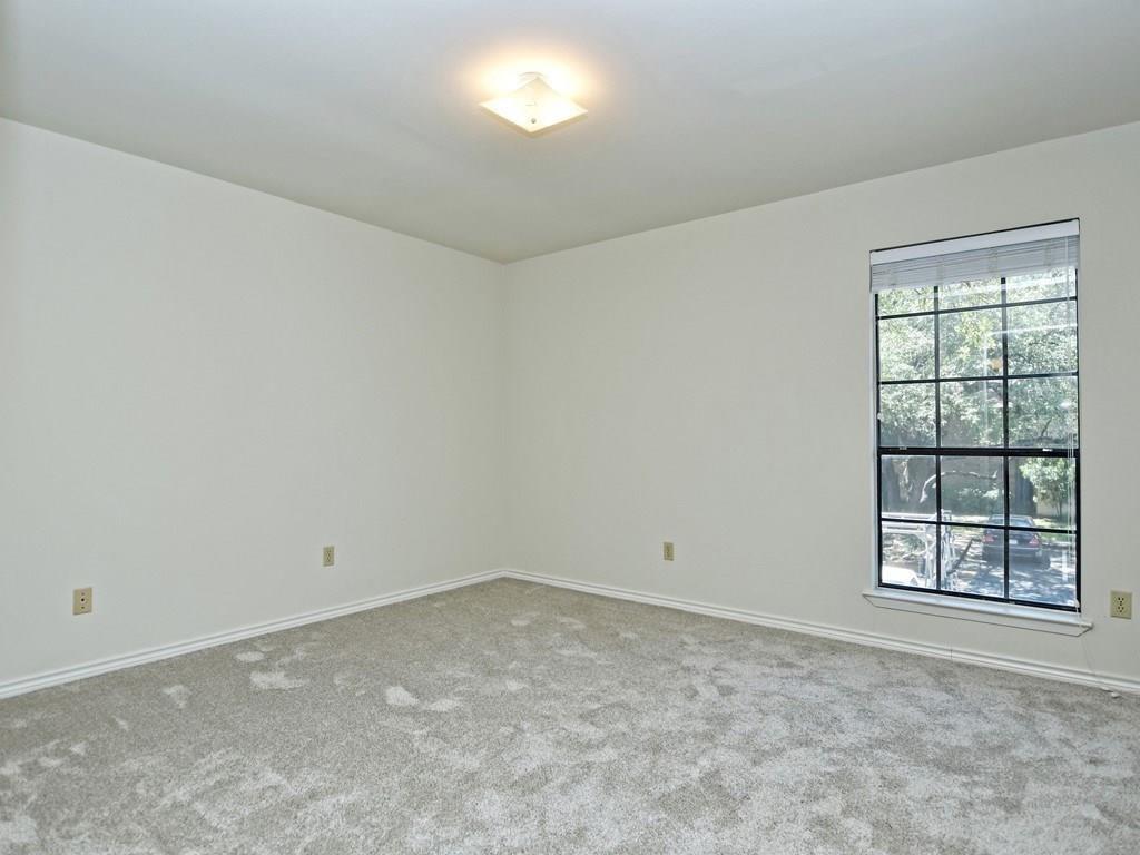 4159 Steck Avenue, Unit 278 Austin, TX 78759 - Photo 21 of 30 Carpeted empty room featuring baseboards