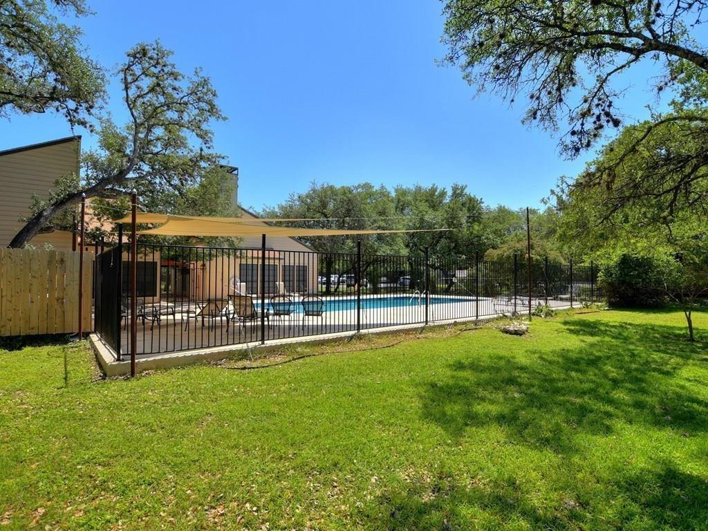 4159 Steck Avenue, Unit 278 Austin, TX 78759 - Photo 28 of 30 Community pool featuring a patio area