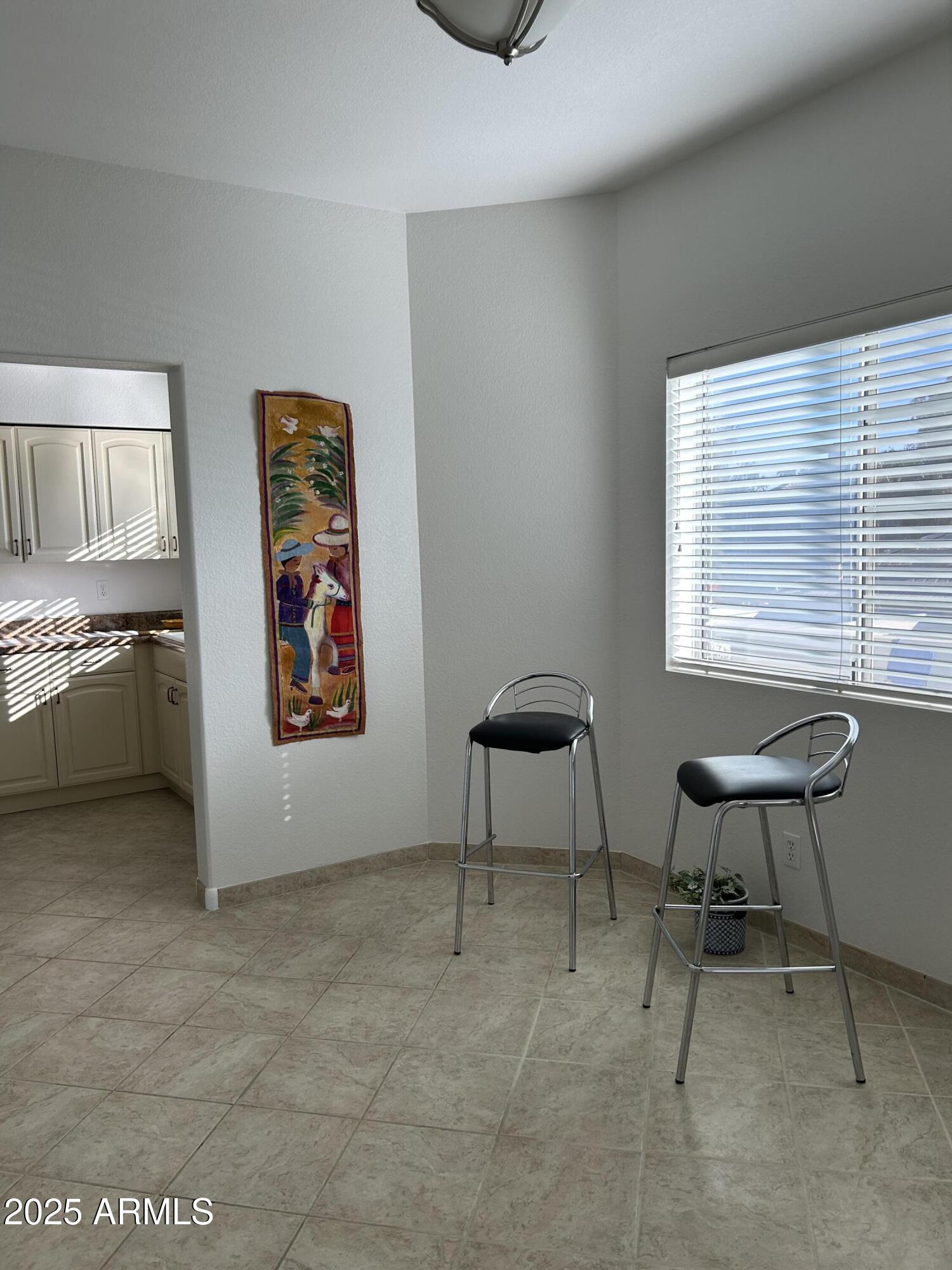 7710 East Gainey Ranch Road, Unit 212 Scottsdale, AZ 85258 - Photo 7 of 33 LIGHT AND BRIGHT DINING AREA