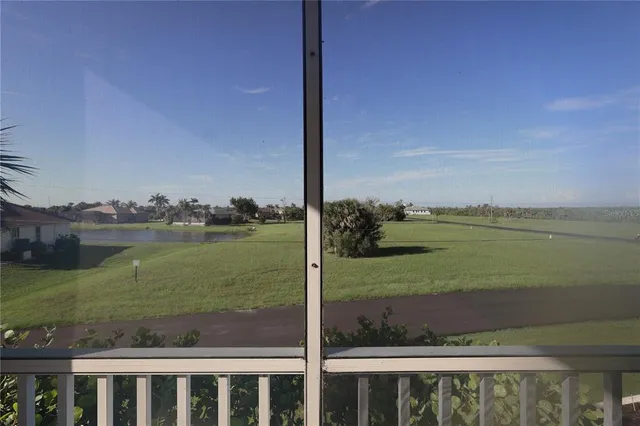 a view of a lake from a yard