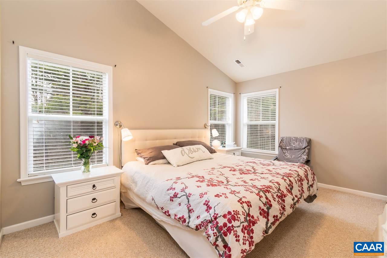 1366 Stoney Ridge Road Charlottesville, VA 22902 - Photo 23 of 33 a bedroom with a large bed and a window