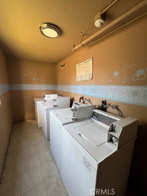 839 North Summit Avenue Pasadena, CA 91103 - Photo 26 of 27 a utility room with dryer and washer