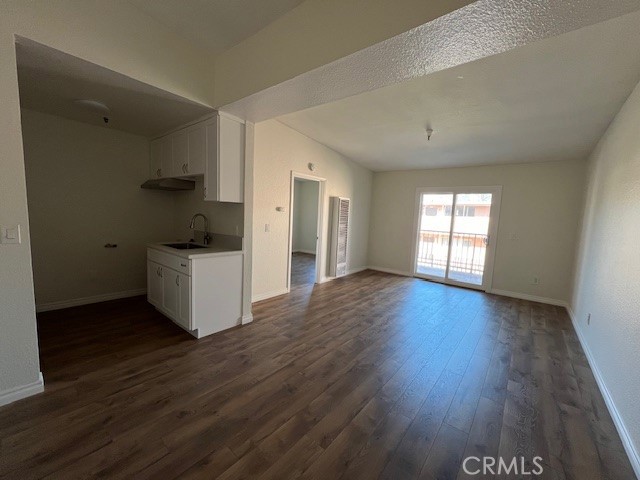 839 North Summit Avenue Pasadena, CA 91103 - Photo 3 of 27 a view of a kitchen with a sink and wooden floor