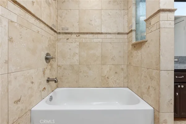 a bathroom with a bathtub