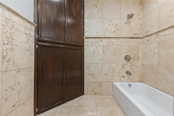 a bathroom with a bathtub