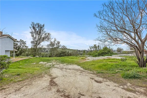 a view of outdoor space and yard
