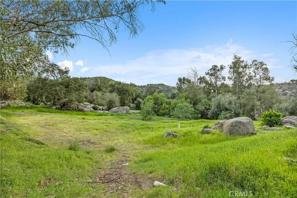 an aerial view of a house with mountain view