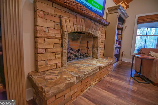 a view of a kitchen with furniture and a kitchen view