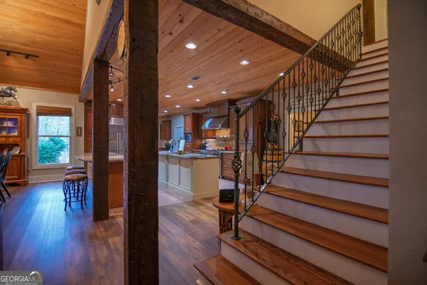 a kitchen with counter top space and cabinets