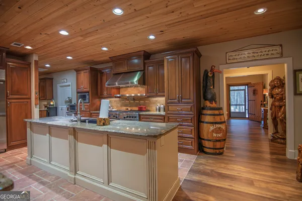 a spacious bathroom with a double vanity sink and a mirror