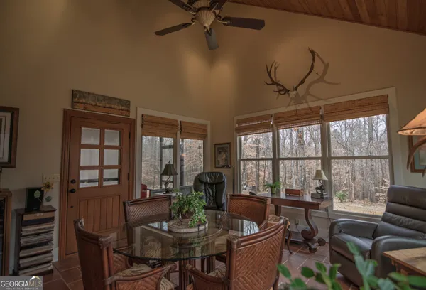 a bathroom with a sink a mirror and a vanity