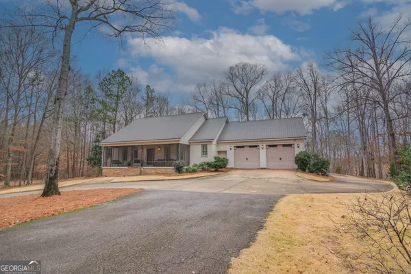 front view of a house with a street