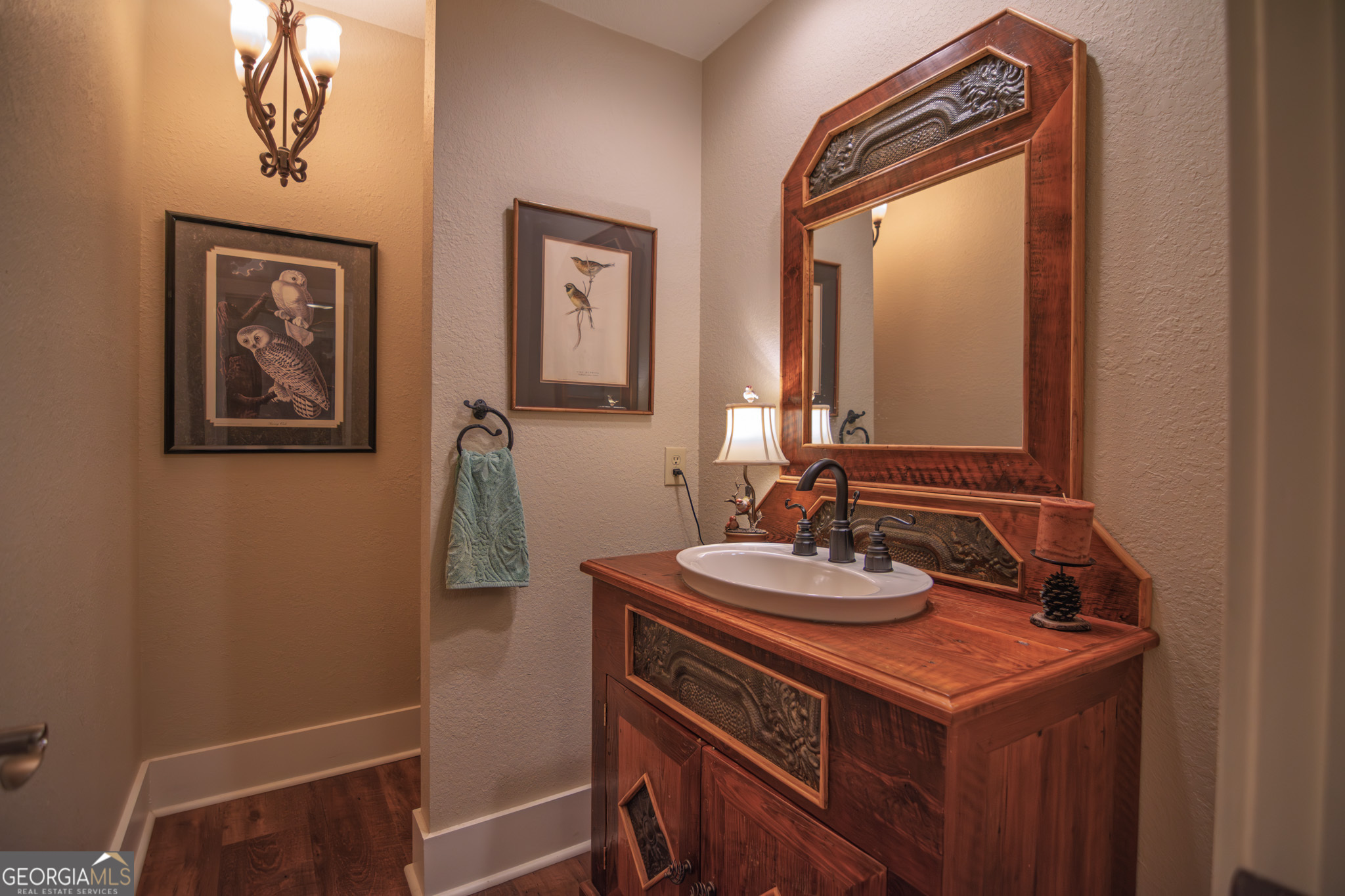 1578 Highway 208 Hamilton, GA 31811 - Photo 49 of 82 a bathroom with a sink a mirror and a vanity