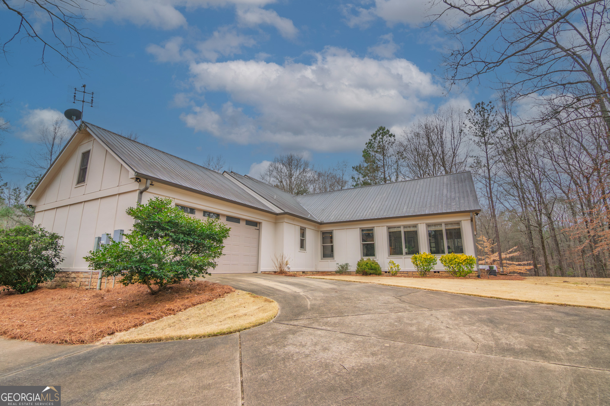 1578 Highway 208 Hamilton, GA 31811 - Photo 73 of 82 a front view of a house with a yard and potted plants