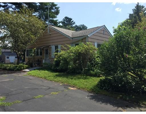 33 Delano Drive Springfield, MA 01129 - Photo 4 of 11 a view of a house with a yard and plants