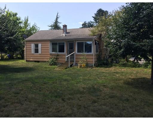 33 Delano Drive Springfield, MA 01129 - Photo 8 of 11 a front view of house with yard and green space
