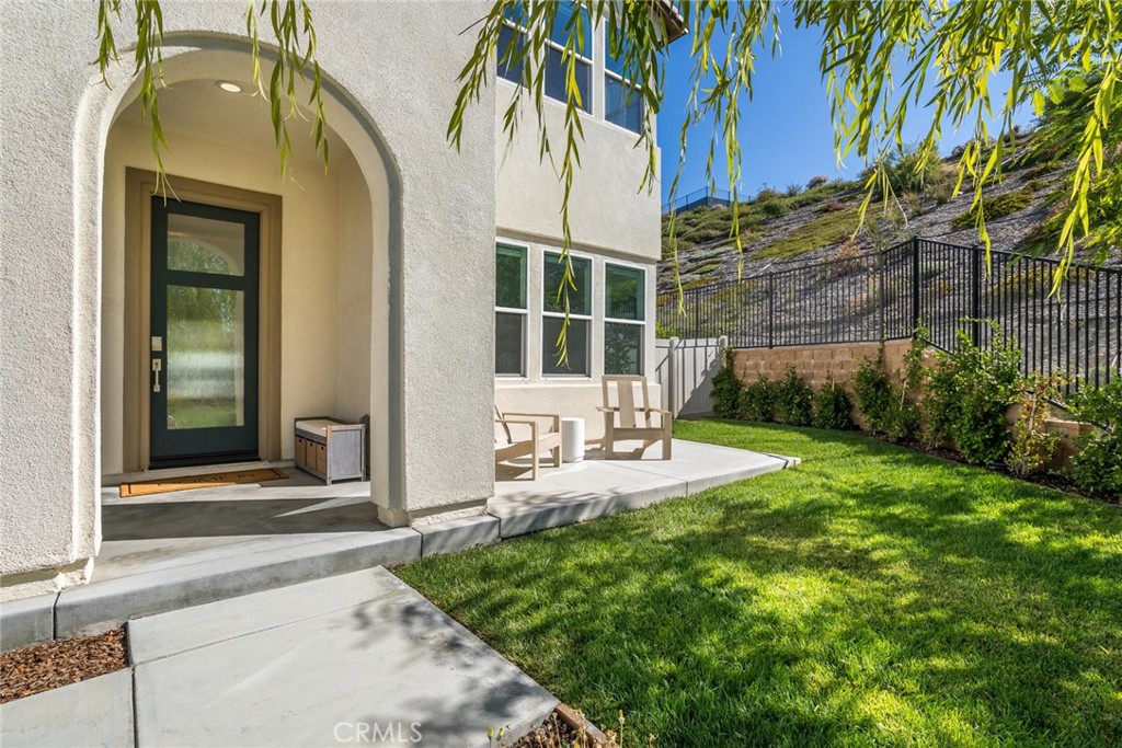 17701 Ridgeline Court Saugus, CA 91350 - Photo 2 of 61 front view of a house with a garden
