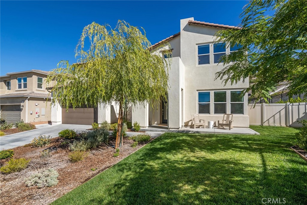 17701 Ridgeline Court Saugus, CA 91350 - Photo 34 of 61 a front view of a house with a yard