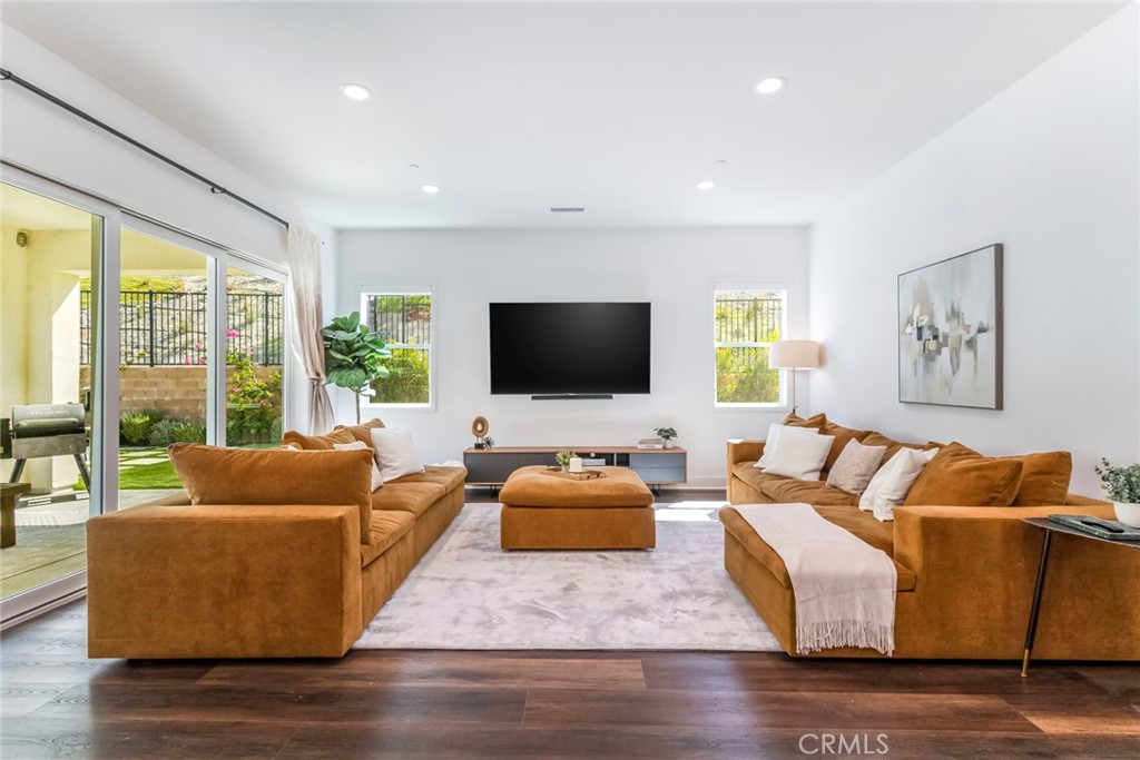 17701 Ridgeline Court Saugus, CA 91350 - Photo 5 of 61 a living room with furniture and a flat screen tv
