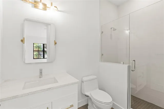 front view of a house with a large window