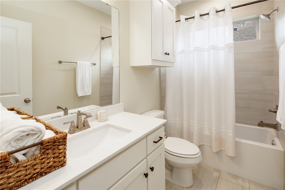 4302 Appalachian Trail Bryan, TX 77802 - Photo 15 of 23 Bathroom with vanity, toilet, shower / tub combo w