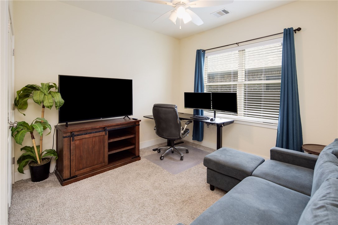 4302 Appalachian Trail Bryan, TX 77802 - Photo 16 of 23 Carpeted office with ceiling fan and baseboards