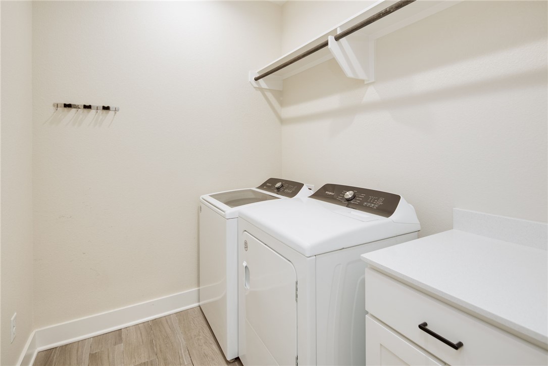 4302 Appalachian Trail Bryan, TX 77802 - Photo 19 of 23 Laundry room featuring independent washer and drye