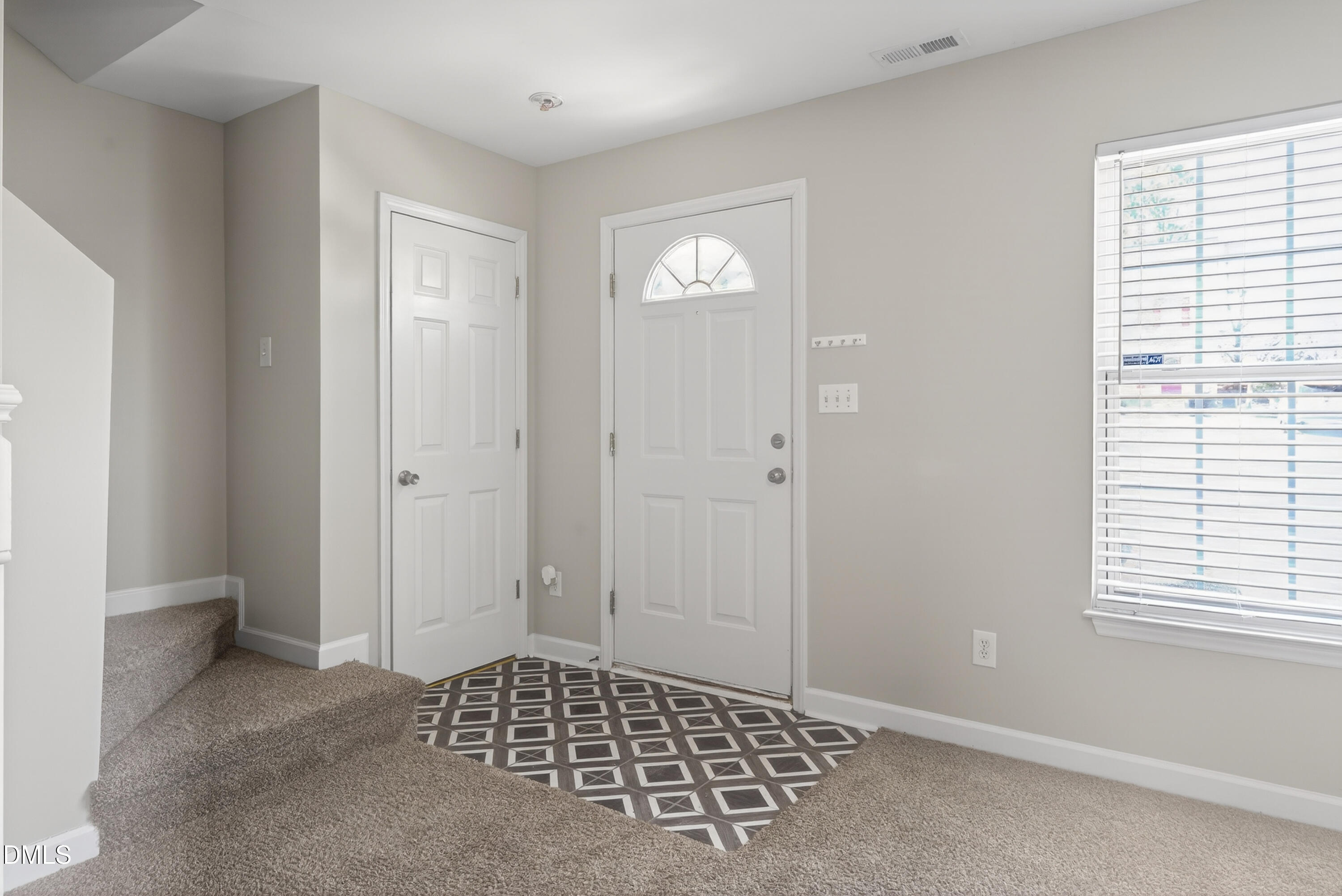 1601 Briarmont Court Raleigh, NC 27610 - Photo 4 of 30 a view of an empty room with window and closet area
