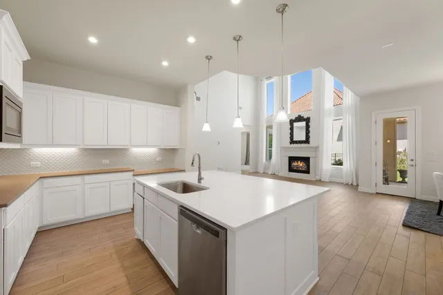 an aerial view of a city with lots of residential buildings