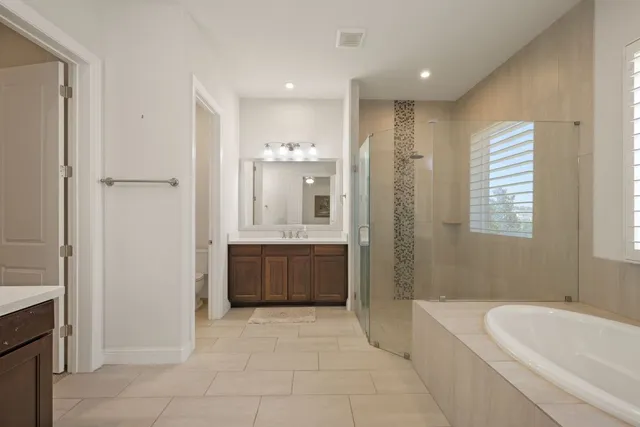 a room with pool and ceiling fan