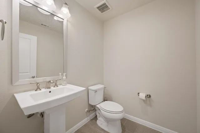 an empty room with closet area