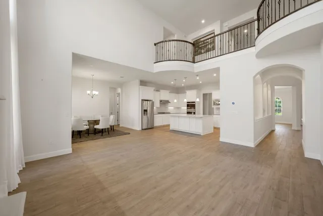 a view of a hallway with seating space