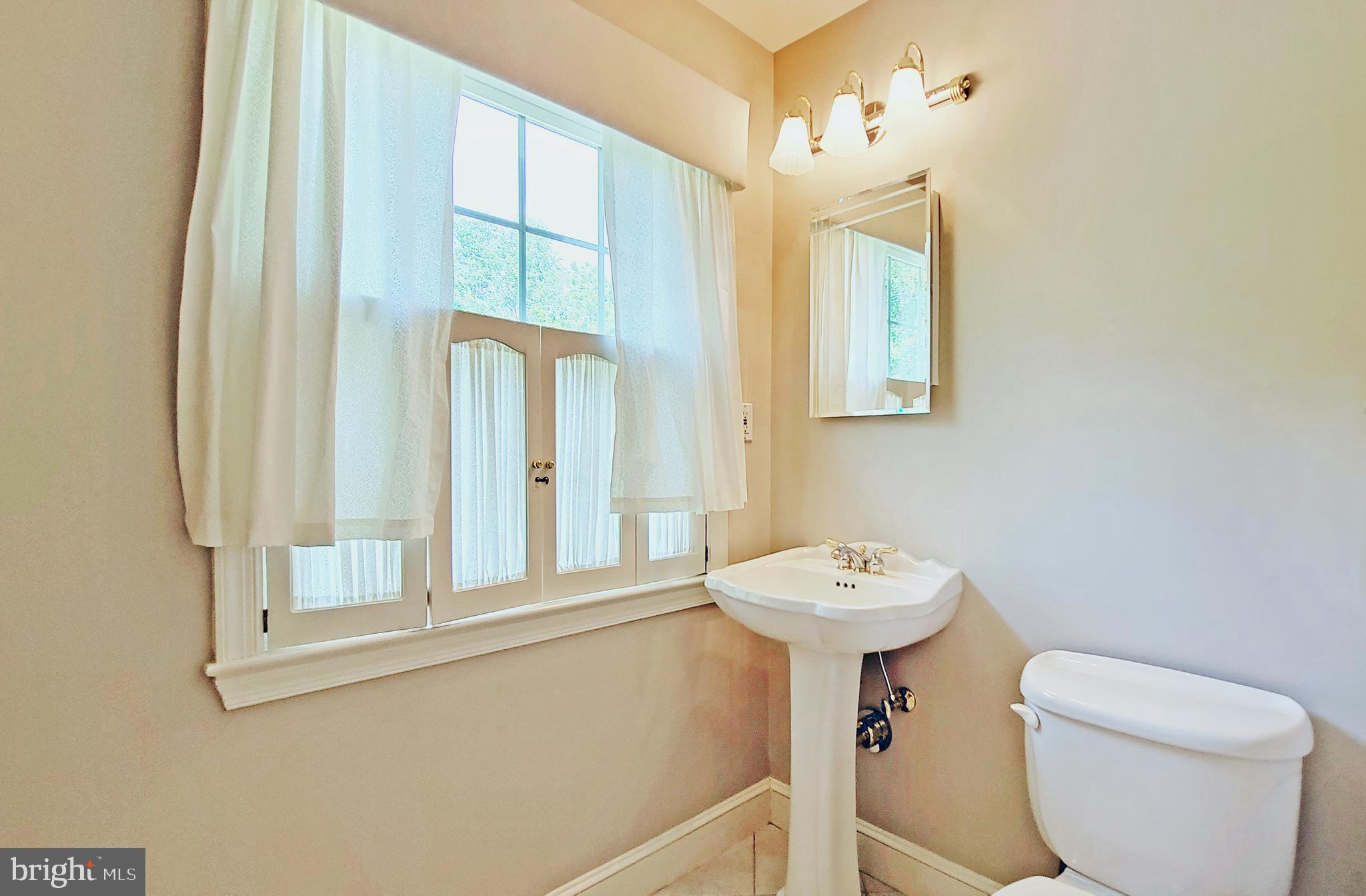 8219 Riding Ridge Place McLean, VA 22102 - Photo 65 of 79 UPDATED HALL BATH HAS TUB TO LEFT