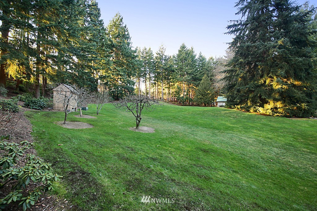 6966 Sills Road Clinton, WA 98236 - Photo 9 of 25 a view of a park with a tree