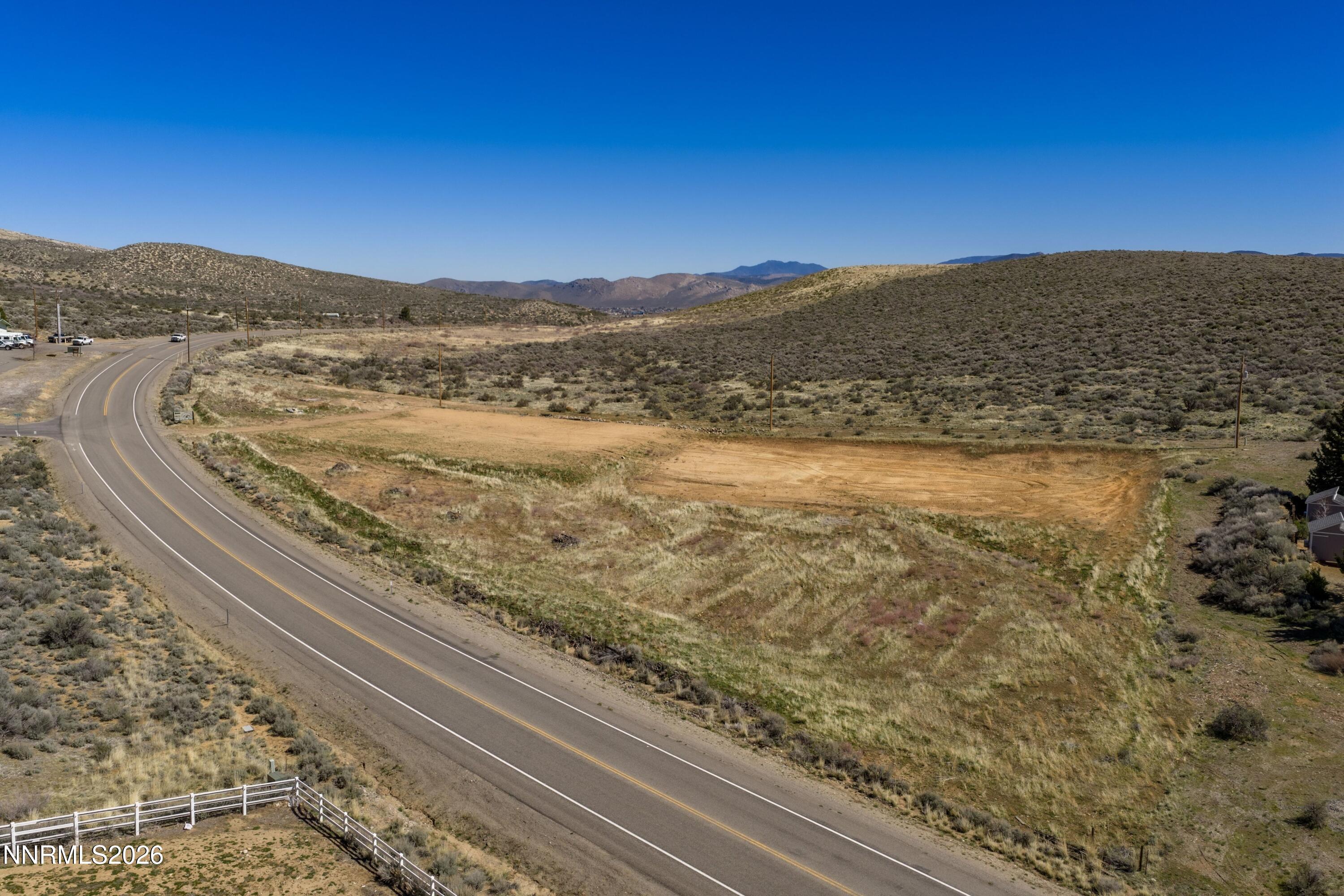 3447 Jacks Valley Road Carson City, NV 89705 - Photo 12 of 15 a view of an ocean beach and mountain