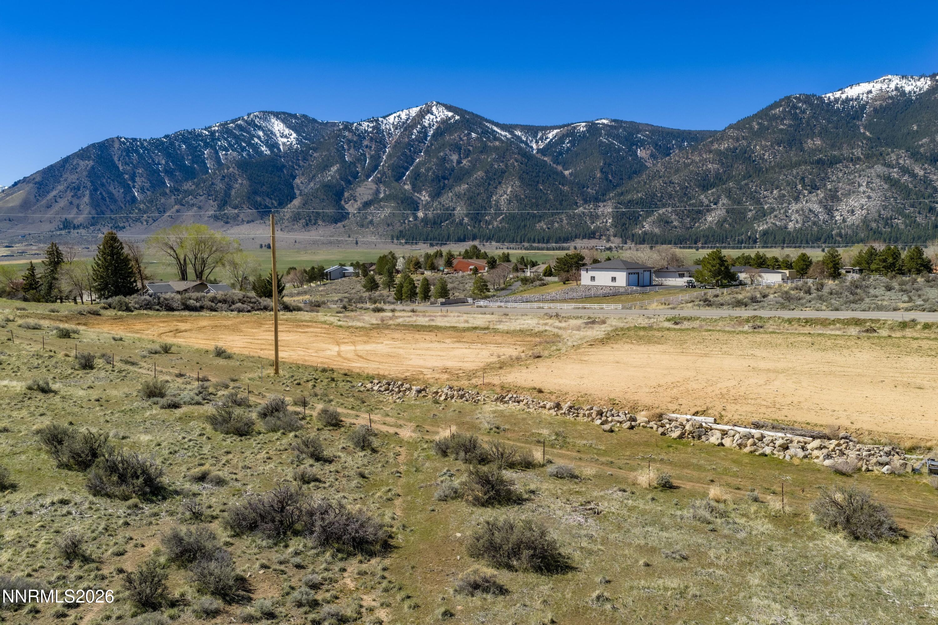 3447 Jacks Valley Road Carson City, NV 89705 - Photo 10 of 15 a view of a backyard with mountain view