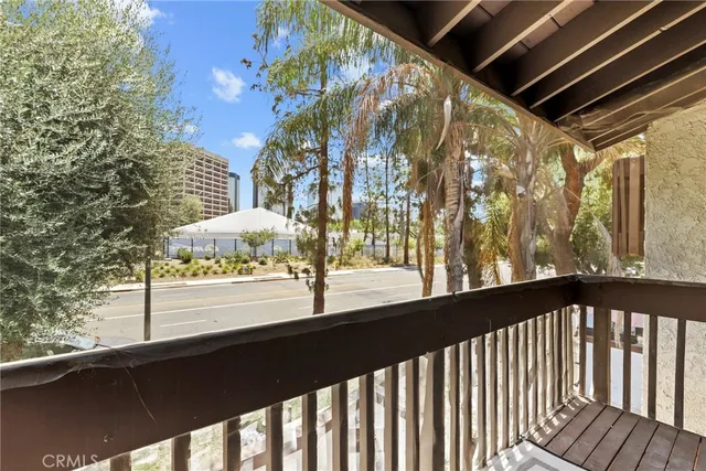 a view of a street from a balcony