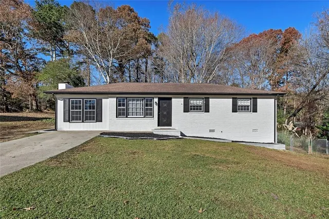 front view of a house with a big yard