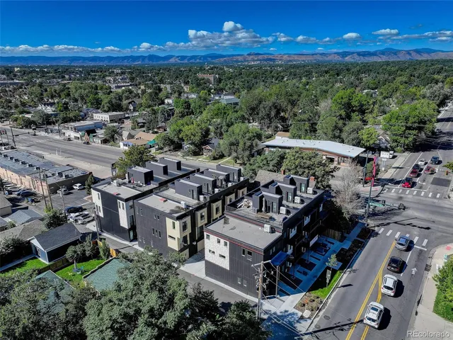 a view of a building with outdoor space and street view